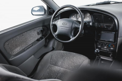 Kia Spectra 1.6 AT (101 л. с.)