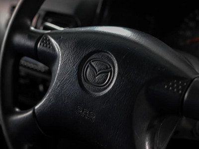 Mazda Familia 1.5 AT (110 л.с.)