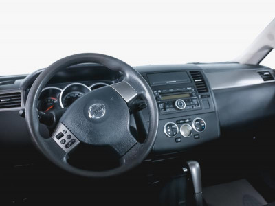 Nissan Tiida 1.6 AT (110 л. с.)